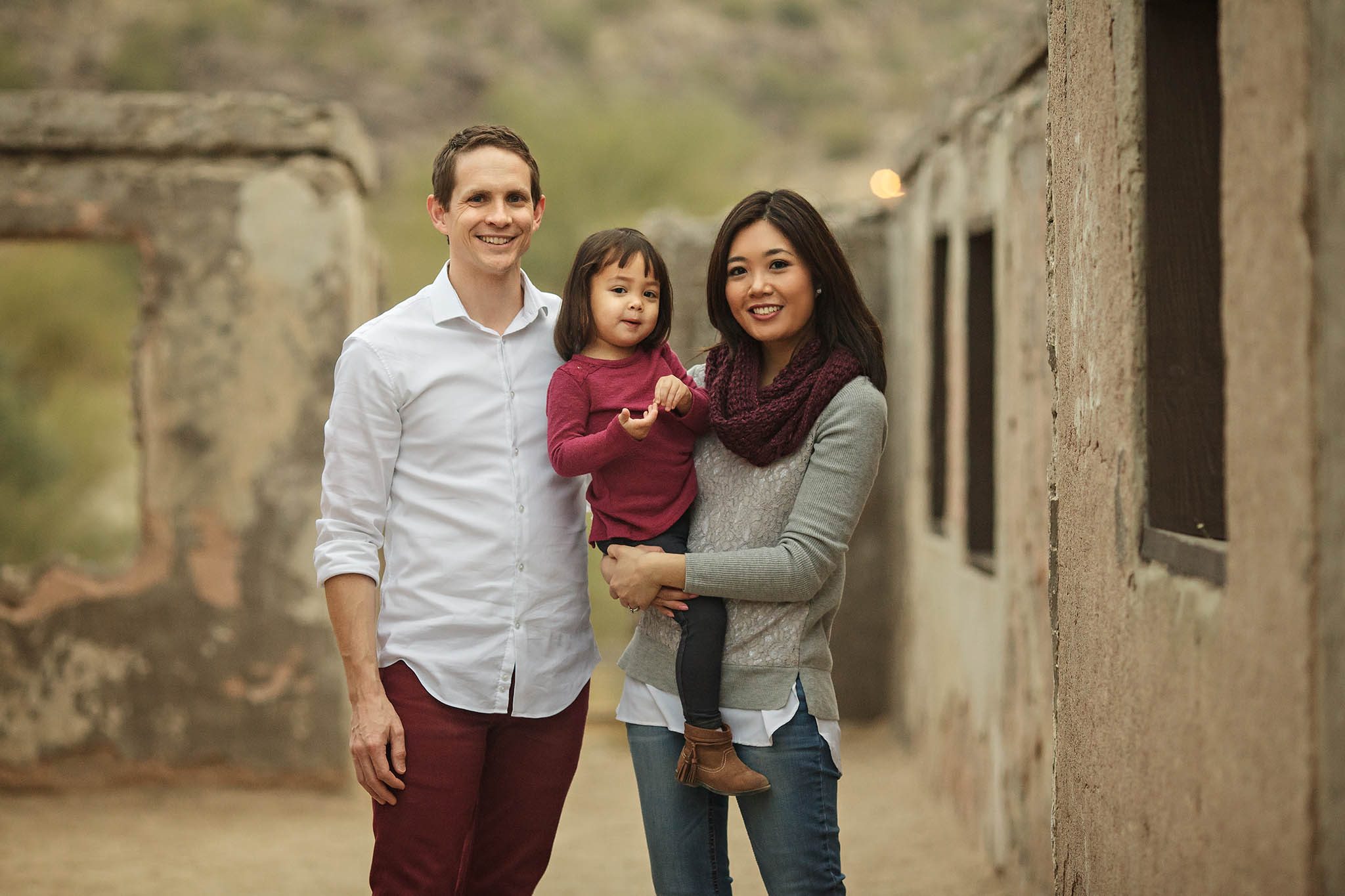 Family of three with two year old girl taken by the best photographer in Arizona