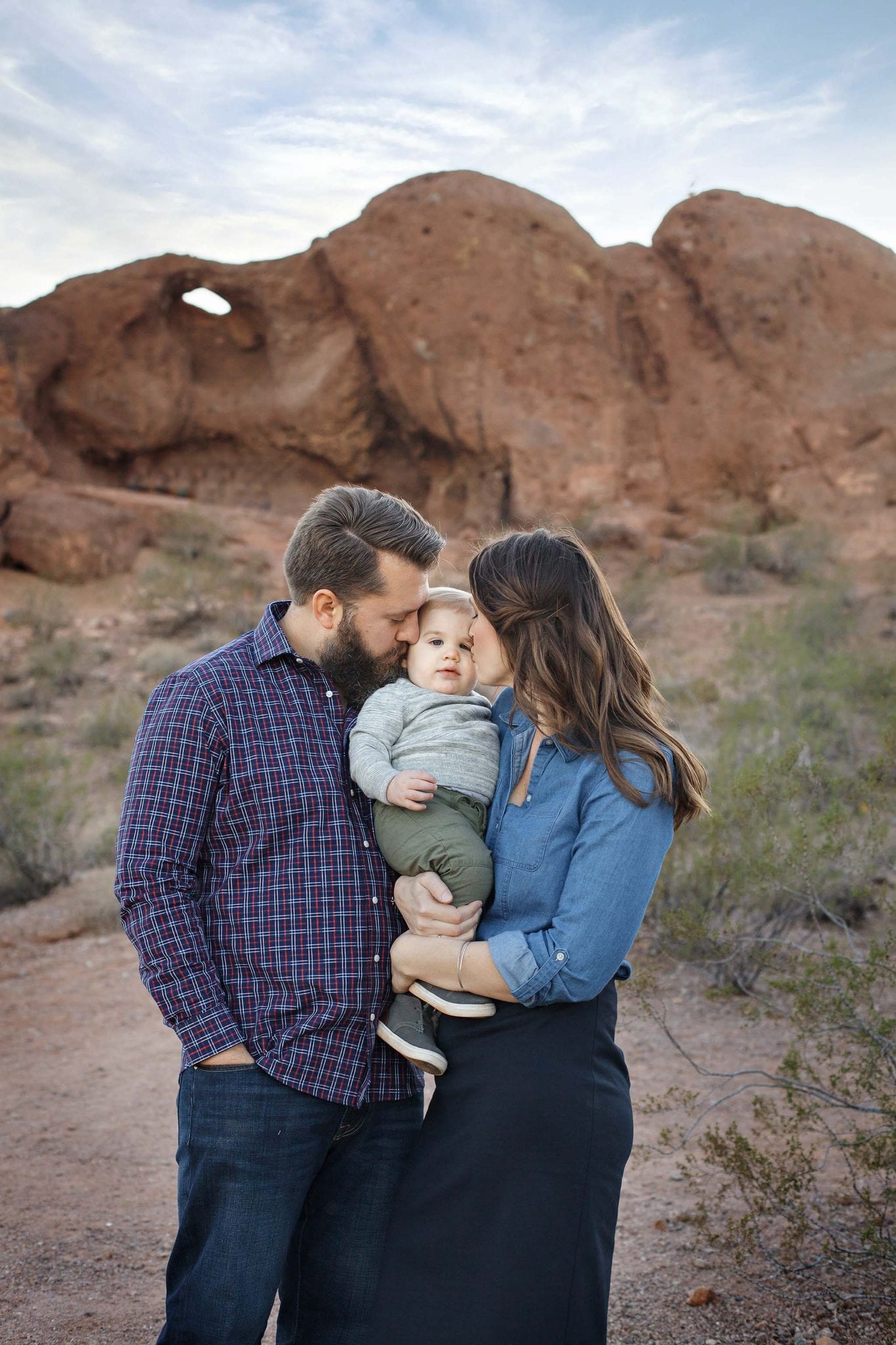 Family of three photo near the hole in the rock in Phoenix, AZ