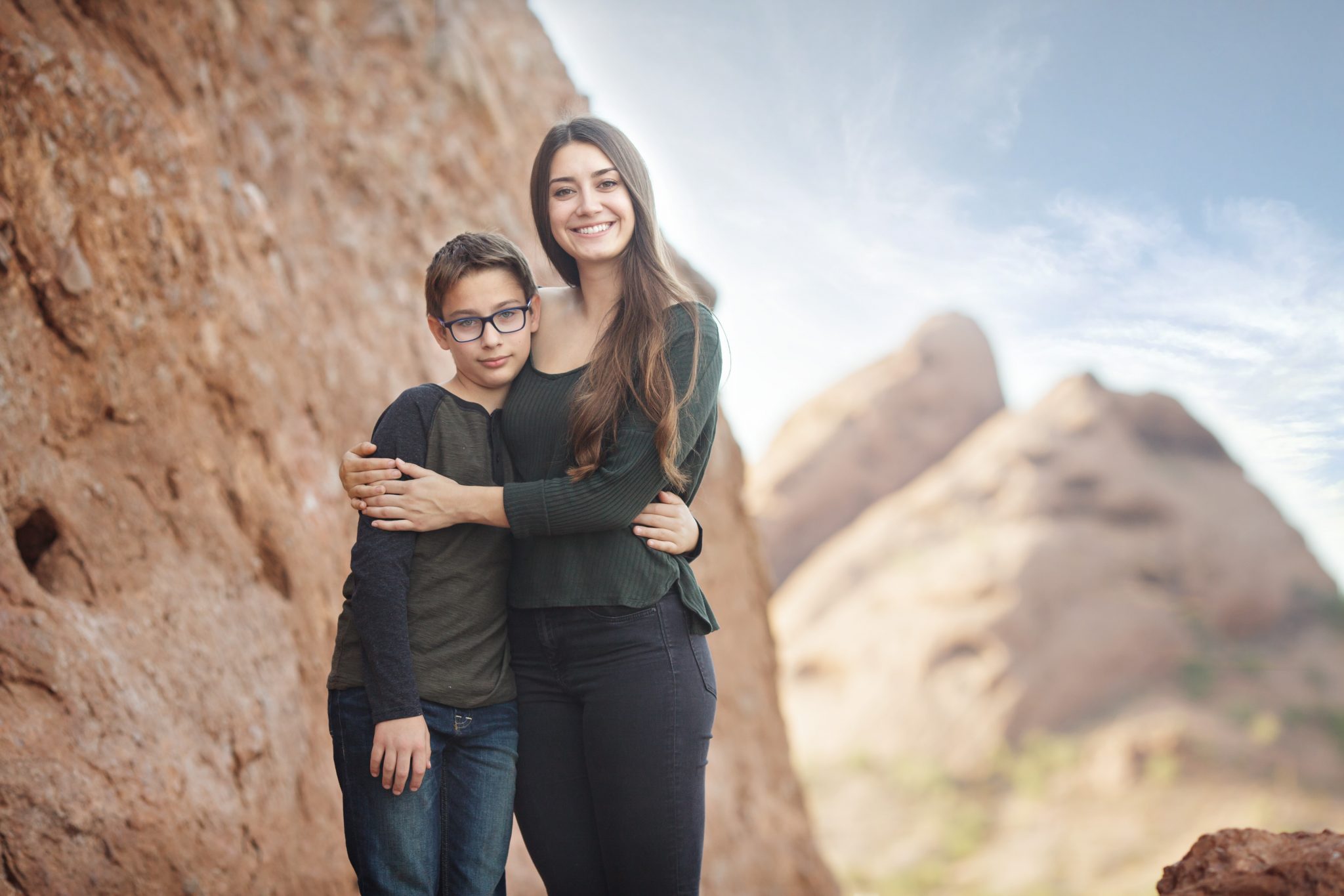 Sibling photography of older children at Papago park in Phoenix, Arizona