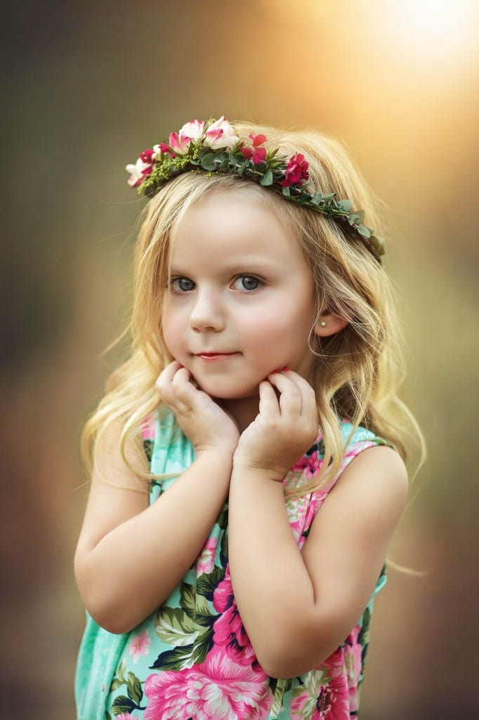 Toddler portrait with flower crown Modeling head shot.