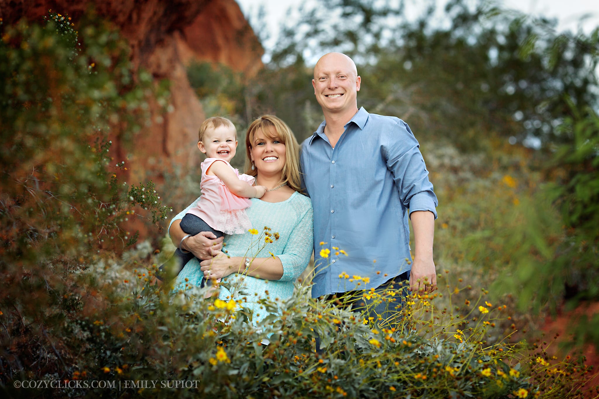 Family of Threee portrait with mom, dad and toddler up in the Phoenix mountains