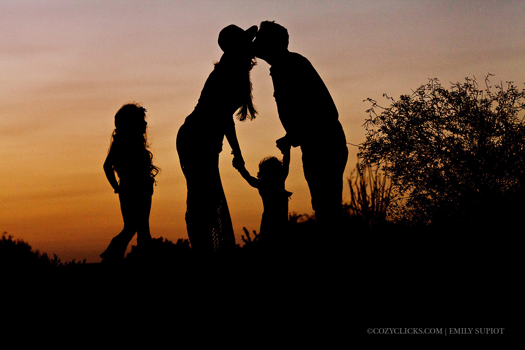 Family of four silhouette photograph taken on South Mountain in Phoenix