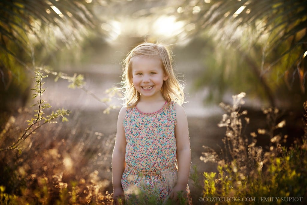 Big smile on four year old girl.  Children's photographer portrait in Phoneix