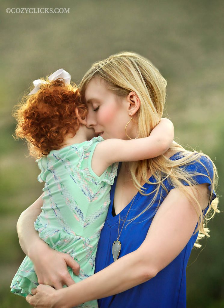 Mother and daughter photography portrait hugging one another