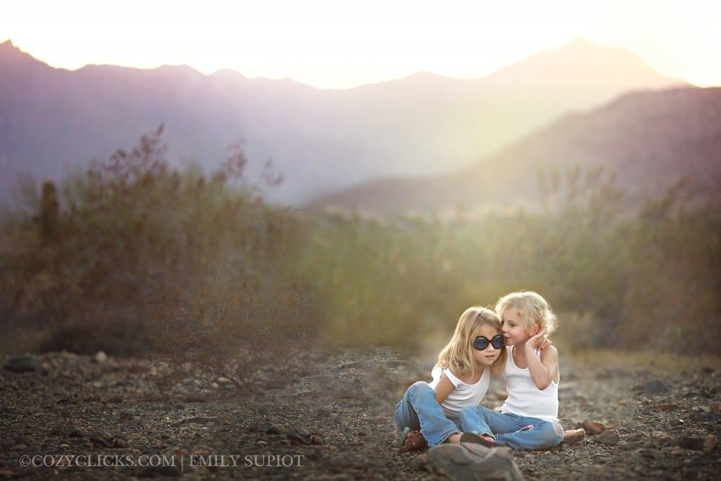 Portrait of sisters sharing secrets in Ahwatukee near South Montain
