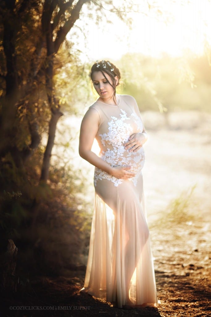 Glowing mom to be in maternity portrait in nude gown with lace