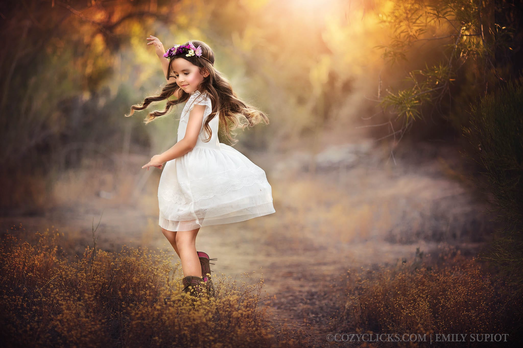 Beautiful four year old portrait of girl dancing in the sunset in Phoenix, AZ