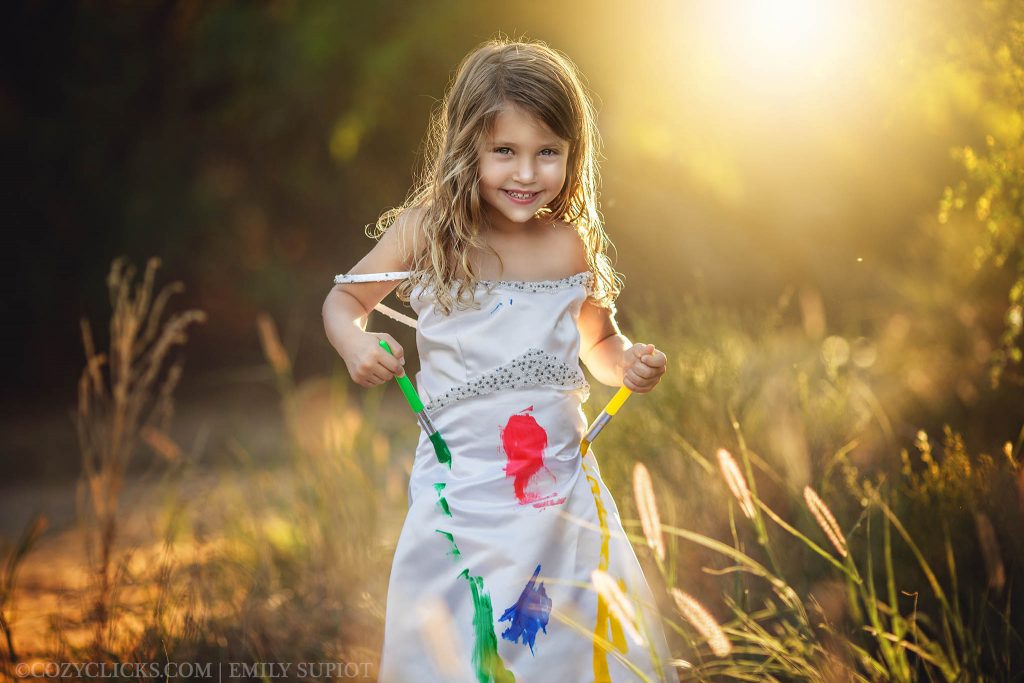Daughter paints wedding gown to trash it in fun session