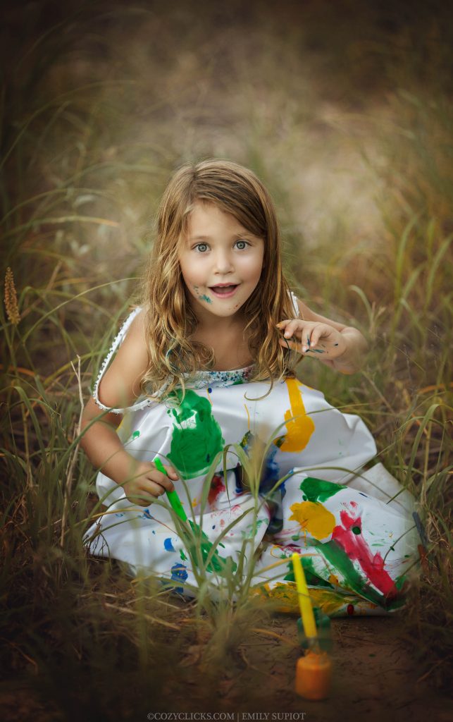 Little girl in moms wedding gown in Phoneix ,AZ children's photographer