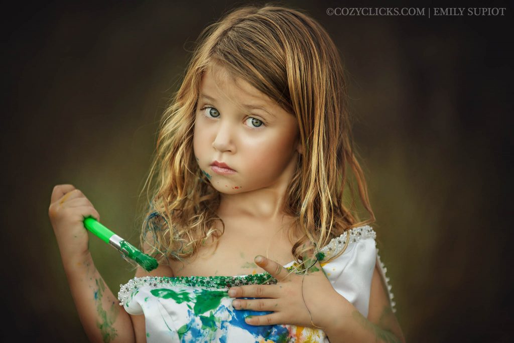 Four year old girl gets to trash the gown in adorable child photography shoot
