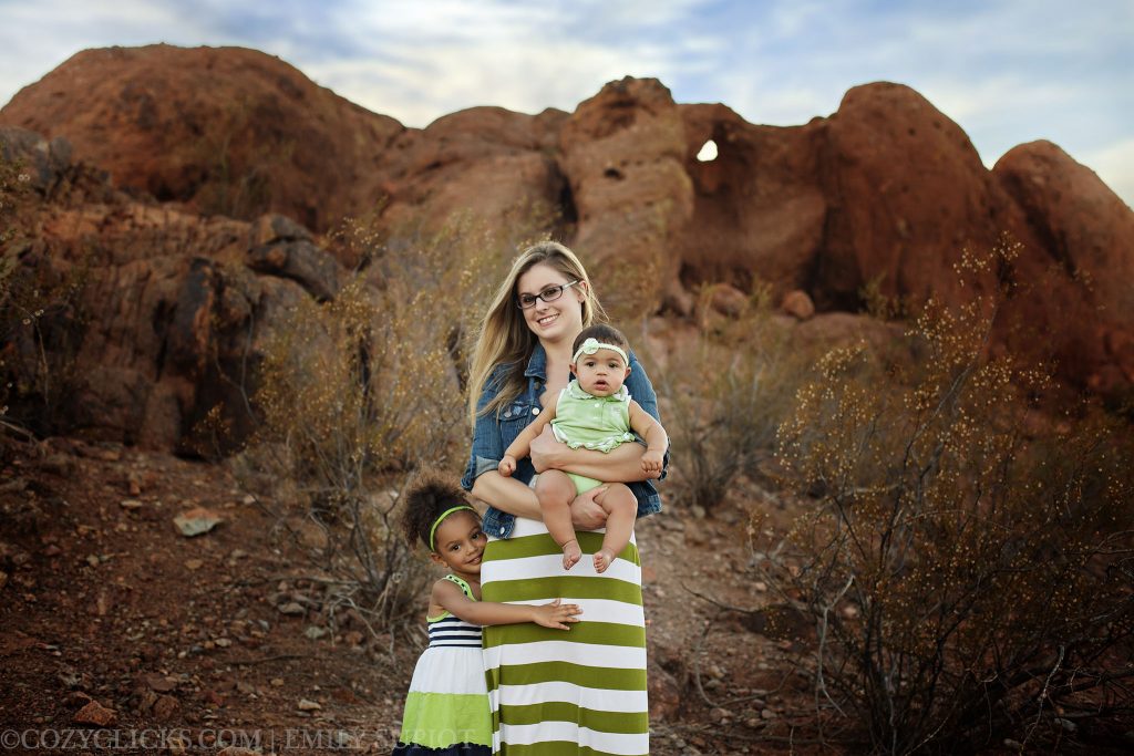 Family portrait takenin fromt of the Hole in the Rock in Phoenix, AZ near the zoo.