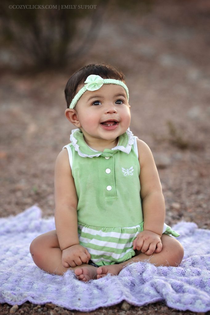 6 month old portrait of girl taken outdoors with natural light at Papago Park 