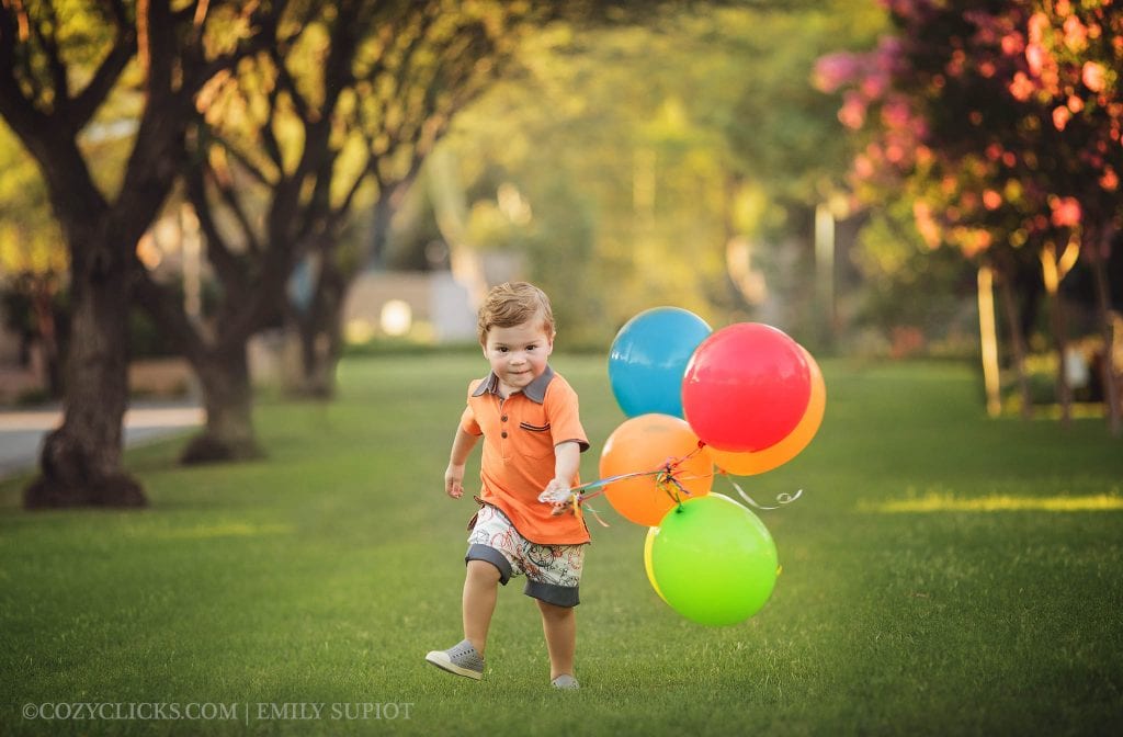 2 year old picture ideas with boy running with balloons
