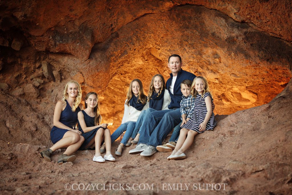 Family of seven poses for a family photo right at the Hole in the Rock in Phoenix