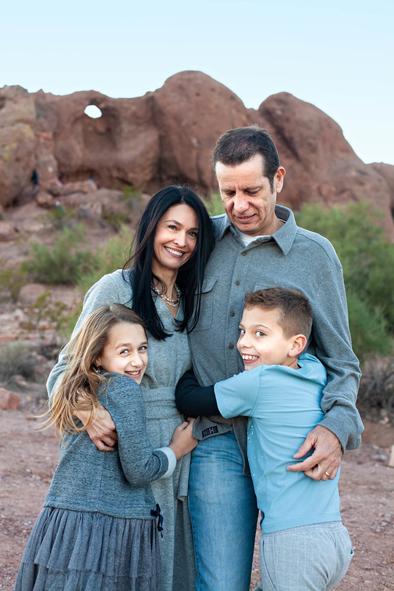 Family of four at Phoenix at the red rock mountains taken by the best photographer in Phoenix